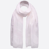 White floral leaf embroidered cotton scarf against white background.