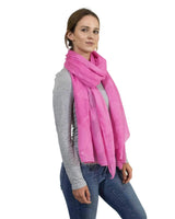 Woman wearing pink scarf, holding Floral Leaf Embroidered Cotton Scarf.