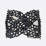 Black beaded bracelet accessory displayed in Flower Beads Hair Double Slide Metal Magic Comb Clip.