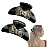 Glamorous Rhinestone Butterfly Hair Clamps - Woman wearing black hat with butterfly.