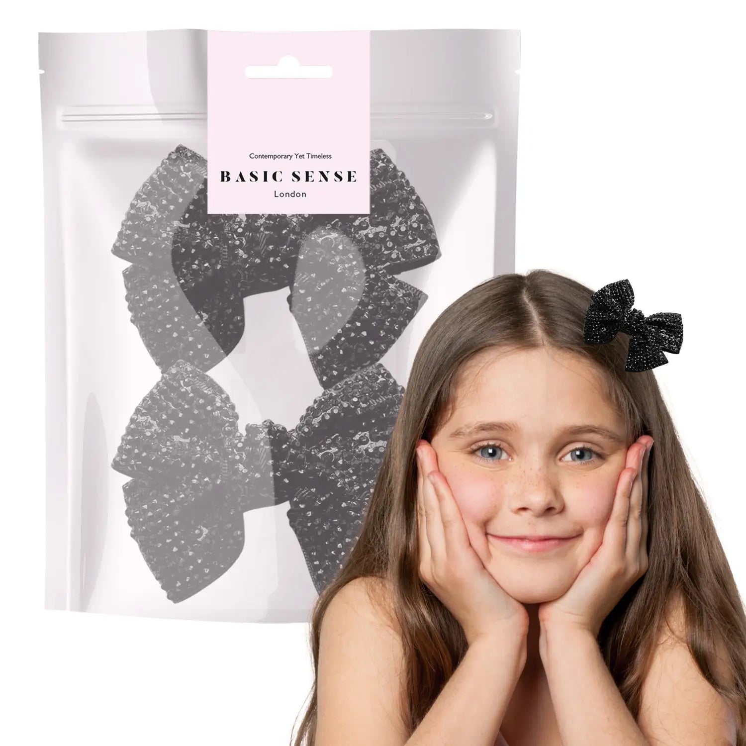 Girl holding rhinestone ribbon alligator hair clips in Glamorous 2 Pack
