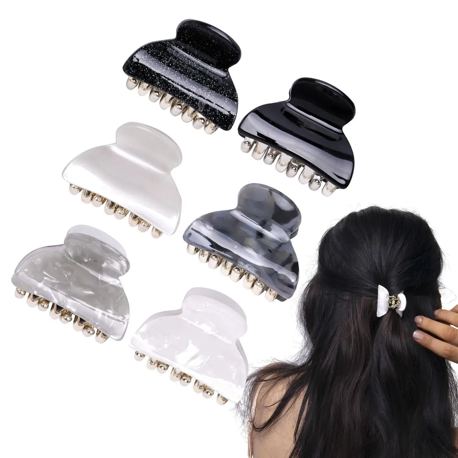 Woman brushing hair with marble pattern hair claw set