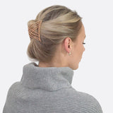 Woman wearing grey sweater with gold hair clip, showcasing Glossy Beaded Design Hair Accessory Magic Comb.