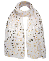 Gold foil music note scarf with white chiffon fabric and gold musical notes pattern