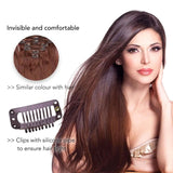 Woman using metal snap clips on brown hair extension