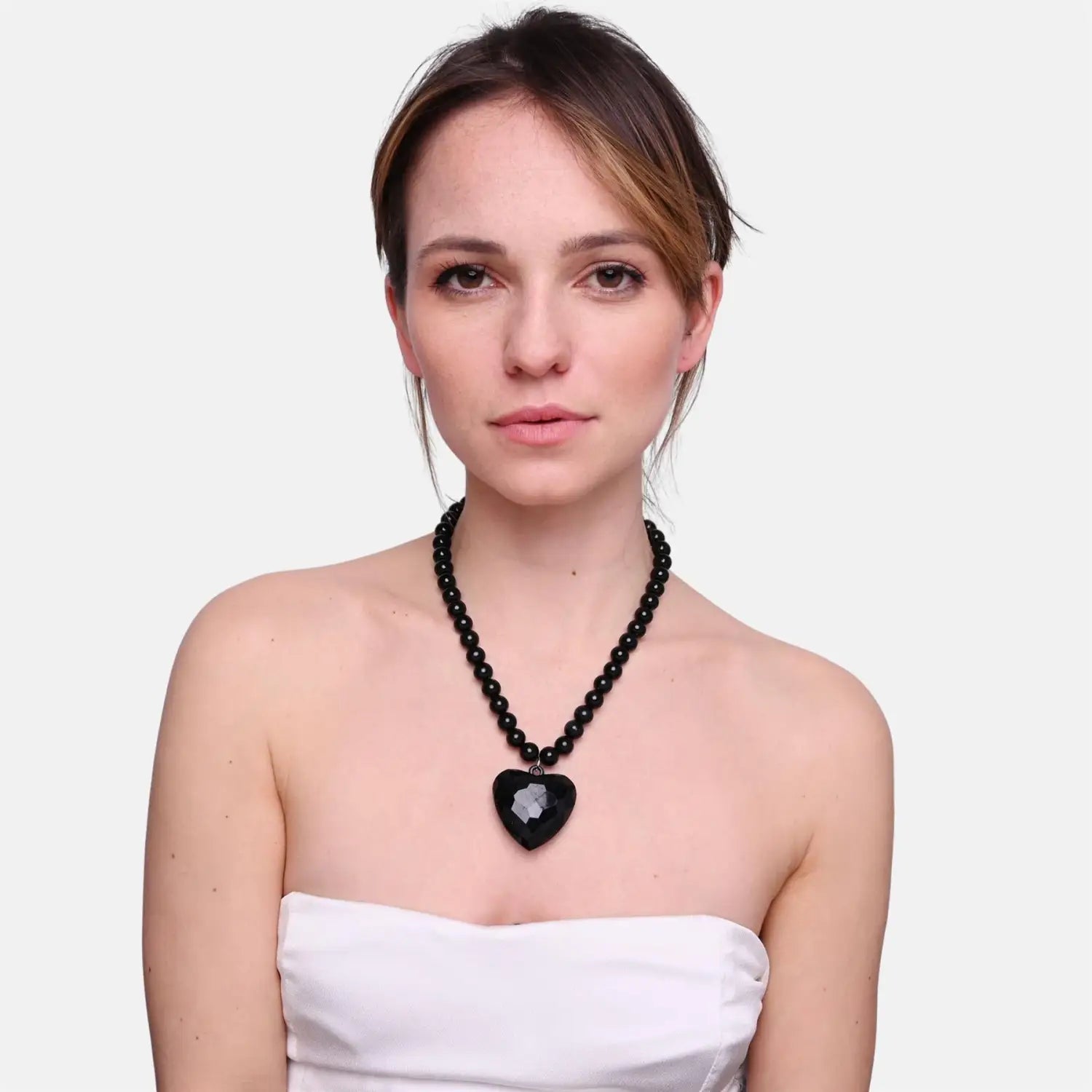 Heart charm ball chain necklace with lightweight plastic design.