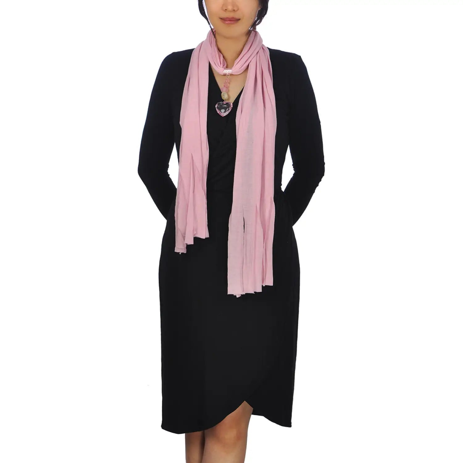 Woman wearing heart pendant jewellery scarf with pink tassel.UnitTesting personal trainer_certification test prep domain_IEnumeratorMeet the green energy experts at our sustainability conference.