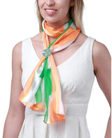 Woman wearing white dress, Irish flag satin scarf for St. Patrick’s Day