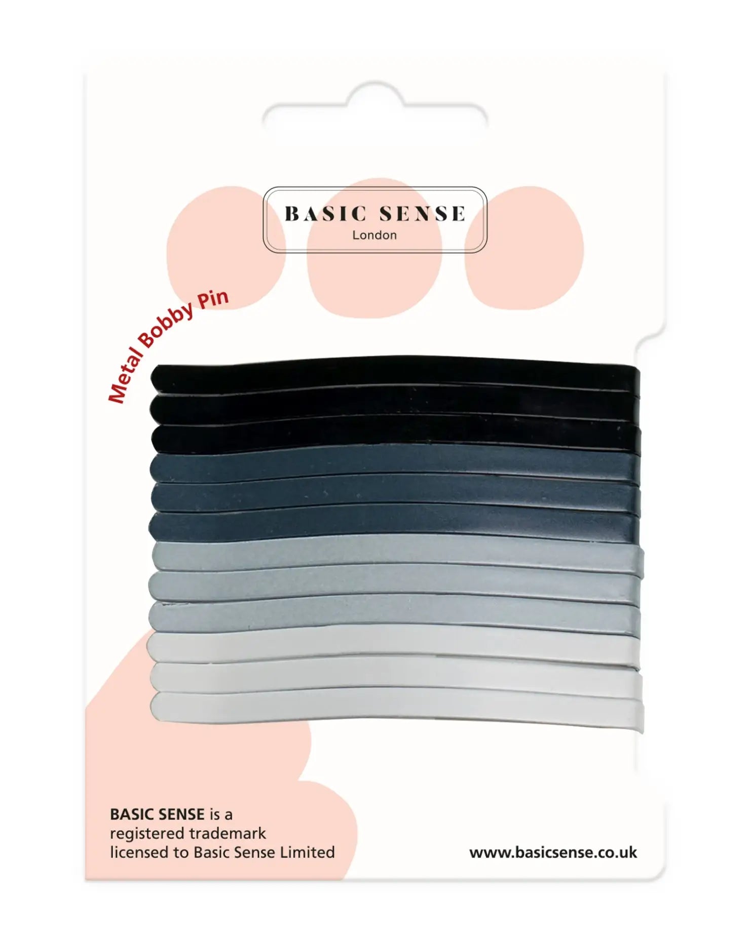 Basic hair ties in black, white, and grey next to Jumbo Metal Bobby Pins Hair Clips.