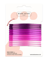 Purple hair ties set on pink background - Jumbo Metal Bobby Pins product display.