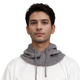 Young man in a white shirt showcasing a knitted hooded scarf for winter warmth