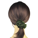 Woman wearing Large Rhinestone Velvet Hair Scrunchies with green flower ponytail accent