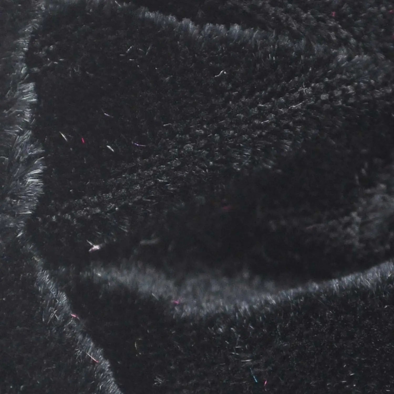 Close up of black velvet hair scrunchies with rhinestones