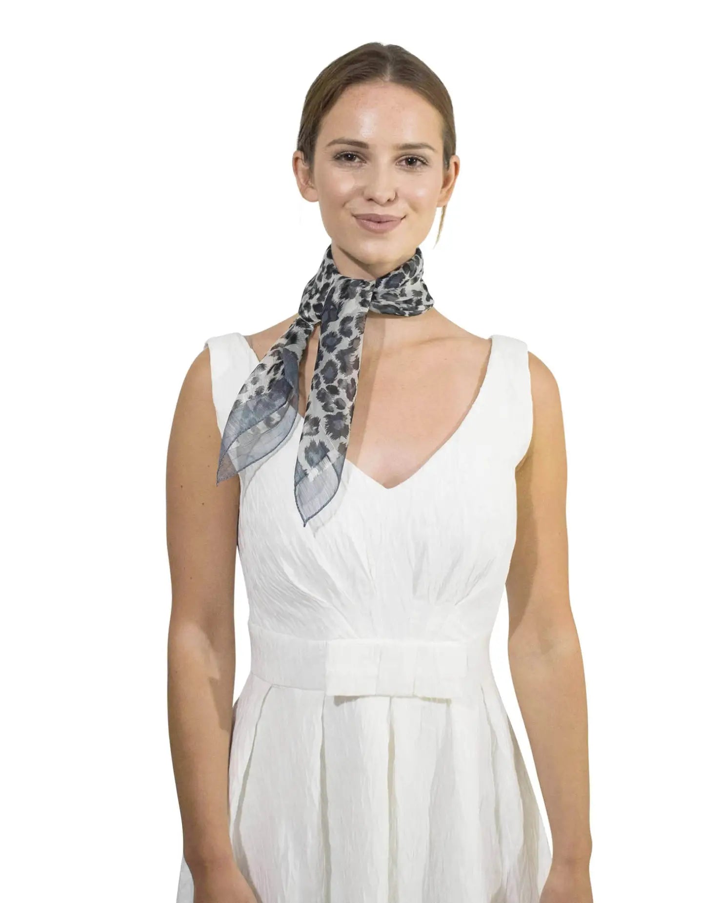 Woman in white dress wearing a Leopard Print Chiffon Square Neck Scarf