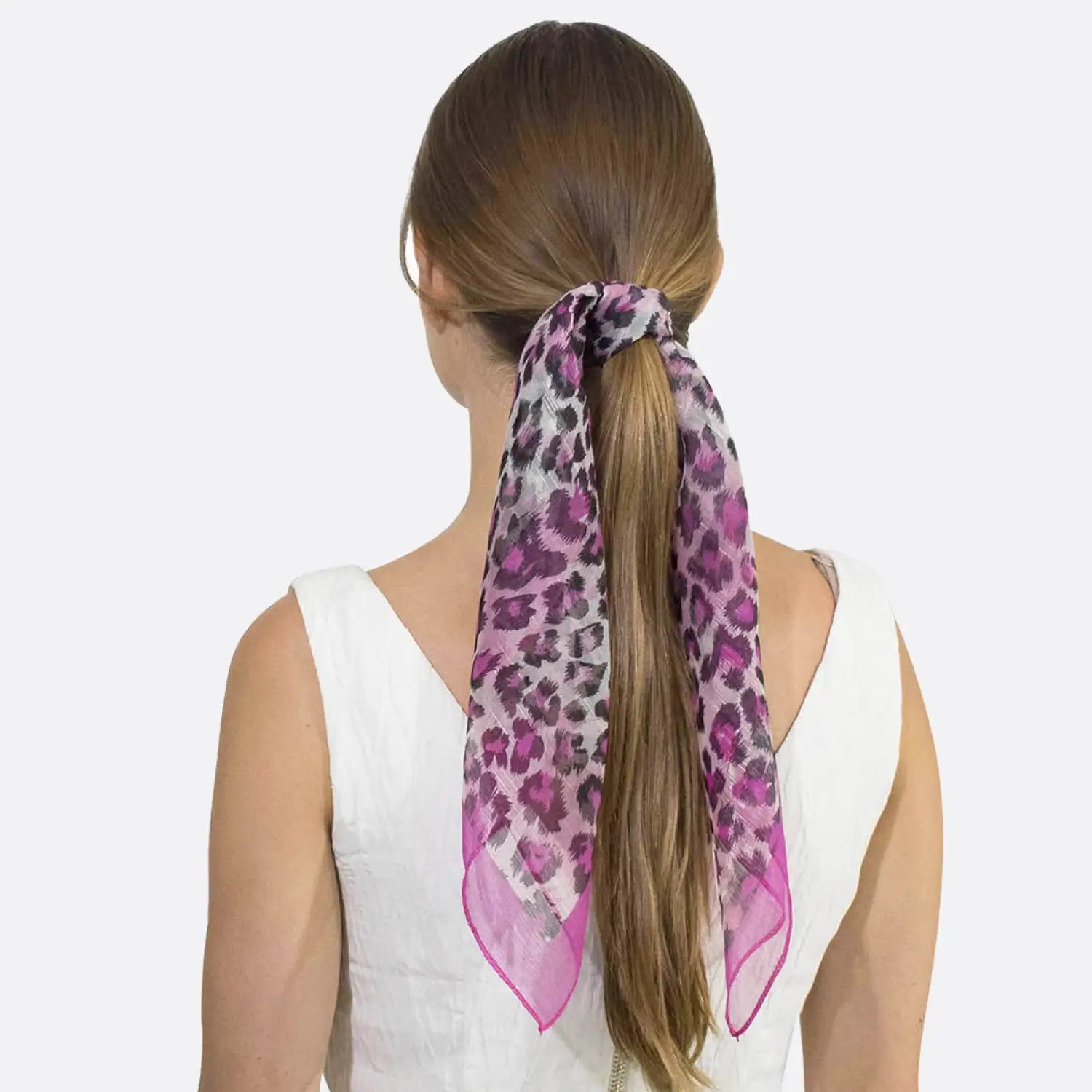 Leopard print chiffon square neck scarf on woman.