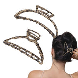 Leopard Print Metal Hair Claw Set - Woman wearing hair clips