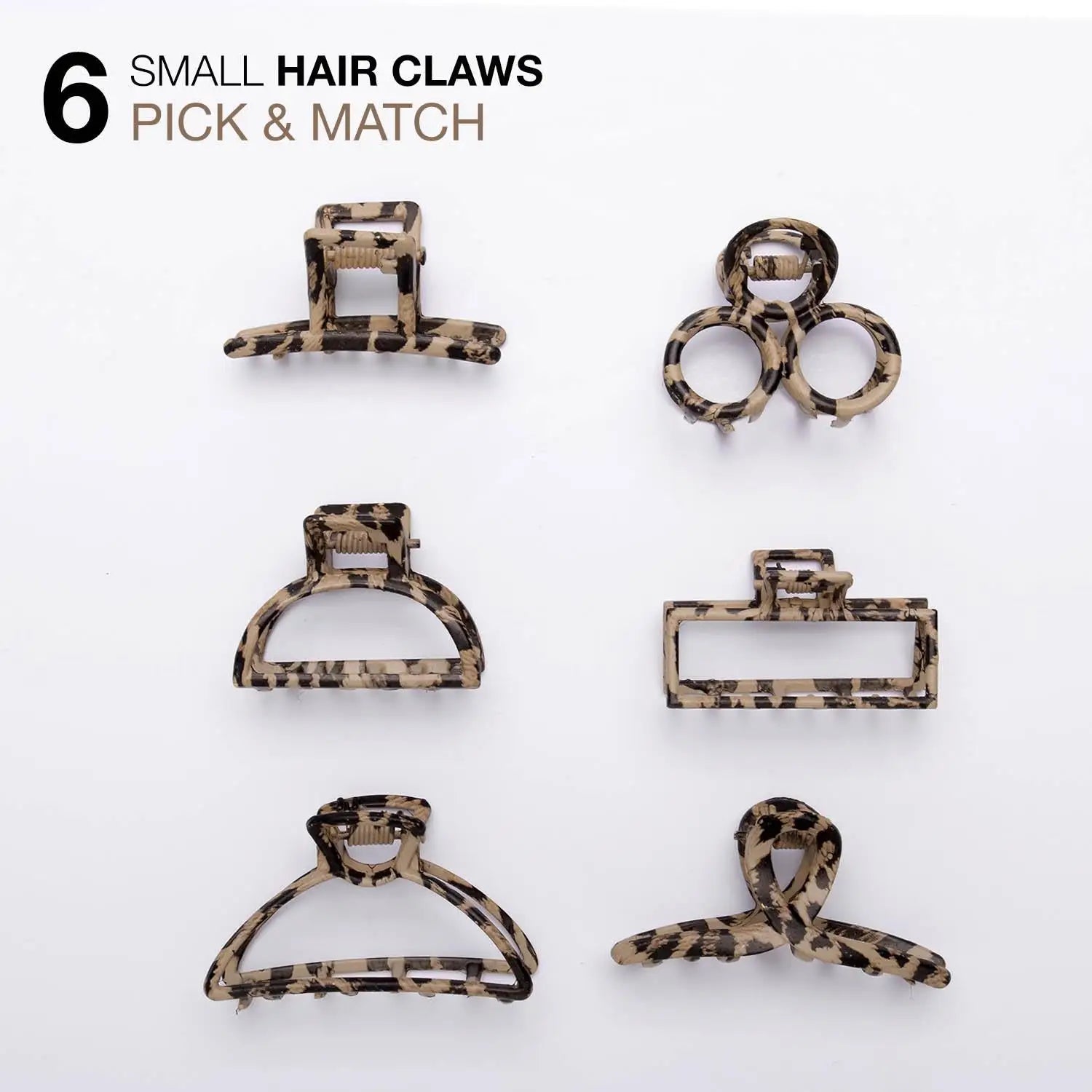 Leopard print hair claw set with various sizes on white surface