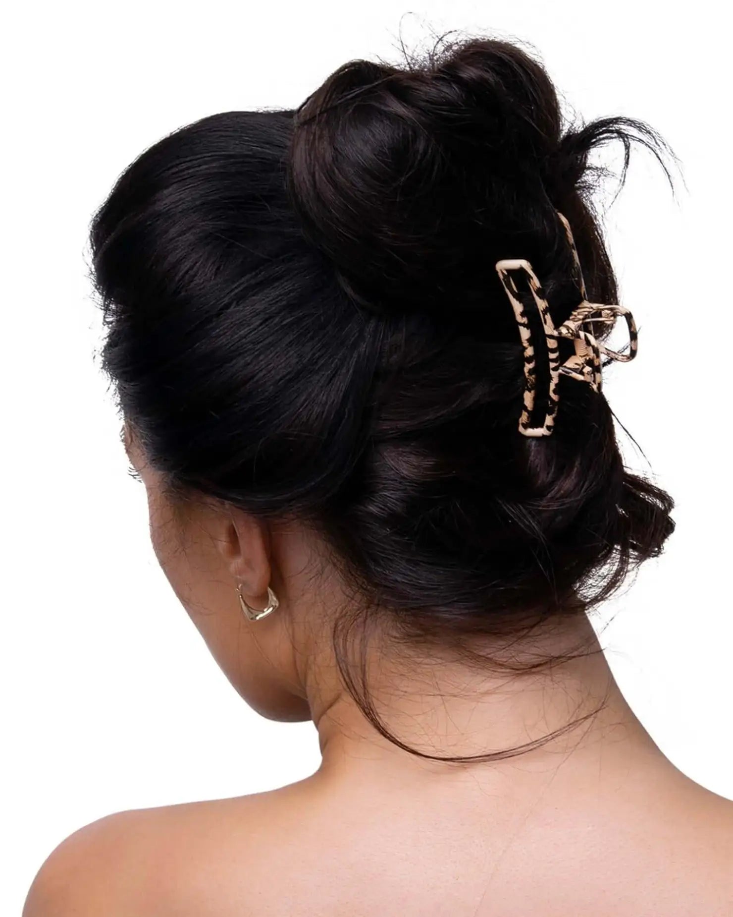 Leopard print hair claw set with woman wearing a hair clip.