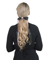 Blonde woman wearing black shirt and pink bow in Long Double Satin Bow Hair Comb product.
