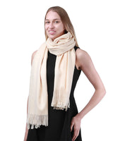 Luxurious cashmere feel oversized scarf on woman.