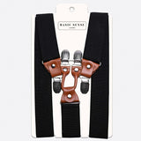 Close-up of mens 35mm Y-shape wide leather braces with gun suspender