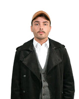 Man in black coat and hat wearing Men’s Authentic Lambskin Leather Baseball Cap.