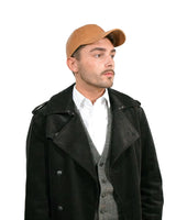Stylish man in black coat and hat wearing Men’s Authentic Lambskin Leather Baseball Cap