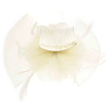 White mesh flower and feather fascinator hair accessory comb on white background.