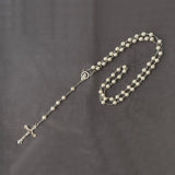 Metallic rosary beads necklace with cross, Jesus crucifix, and saints pendant.
