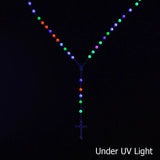 Colorful light string ceiling decor depicting saints pendant metallic rosary beads necklace.