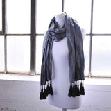 Metallic shimmer tassel scarf on mannequin