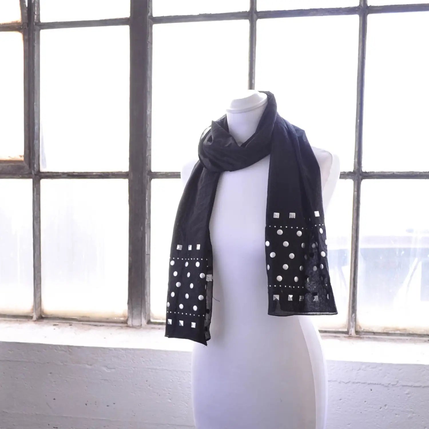 Metallic studded shimmering lightweight scarf on mannequin