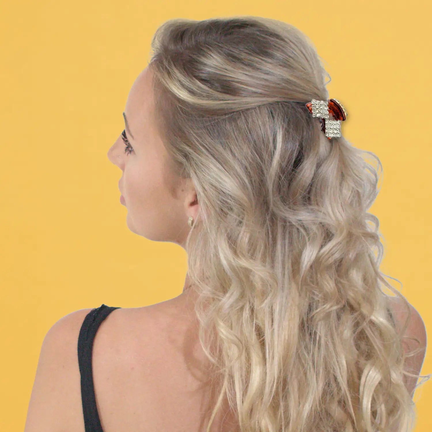 Blonde woman with a red flower in her hair, wearing Mini Diamante Crystal Double Diamond Hair Claw 2pcs