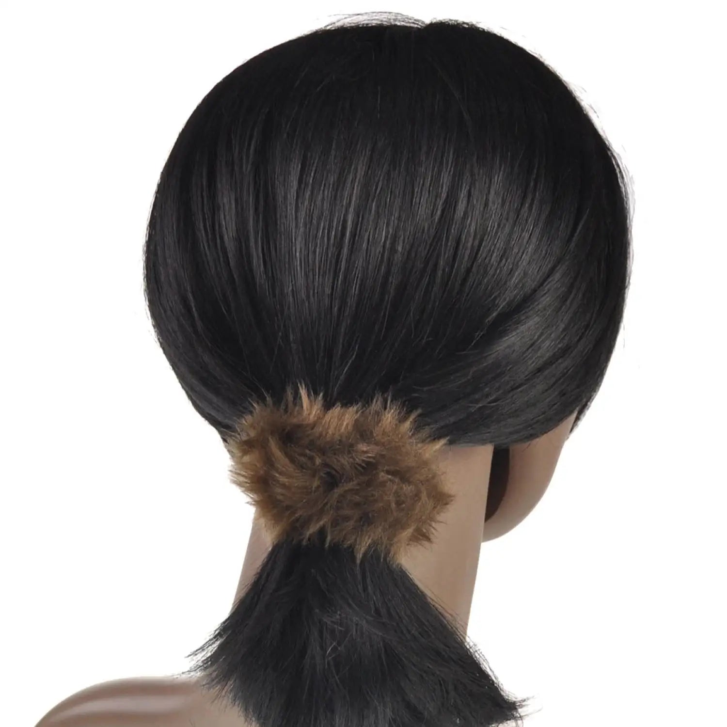 Soft faux fur scrunchie in brown fur on woman with ponytail