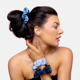 Mulberry silk hair scrunchies with blue bow accent on woman