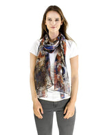 Woman wearing multicoloured animal print chiffon scarf with painting pattern