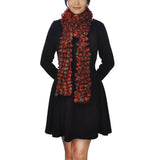 Woman in black dress and red scarf featured in Multicoloured Textured Boa Print Scarf.