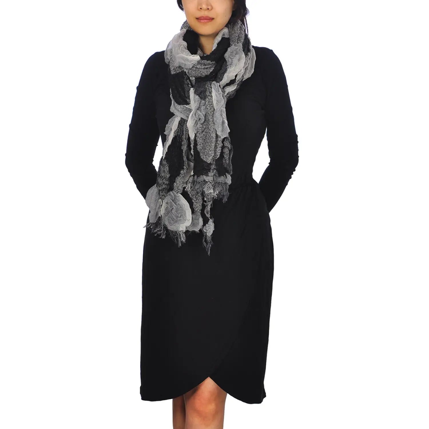 Woman wearing black dress and two-toned textured reversible scarf from ’Multicoloured Two-Toned Textured Reversible Autumn Winter Scarf’.