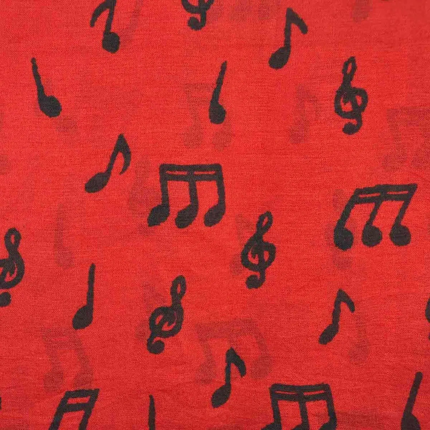 Red background with black music notes on a pure silk scarf