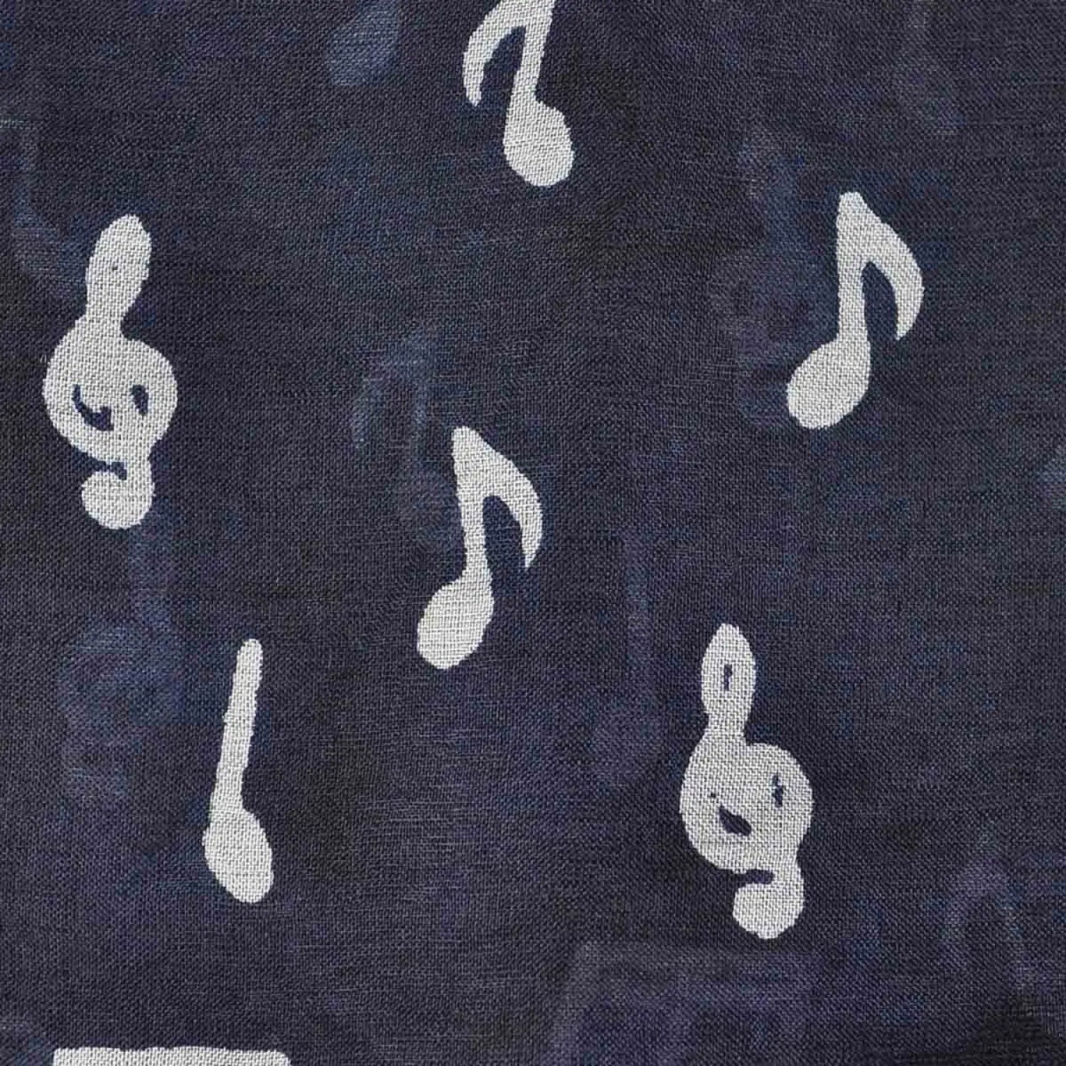 Black and white musical note pattern silk scarf.