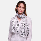 Woman wearing a white shirt and Musical Note Satin Stripe Soft Scarf