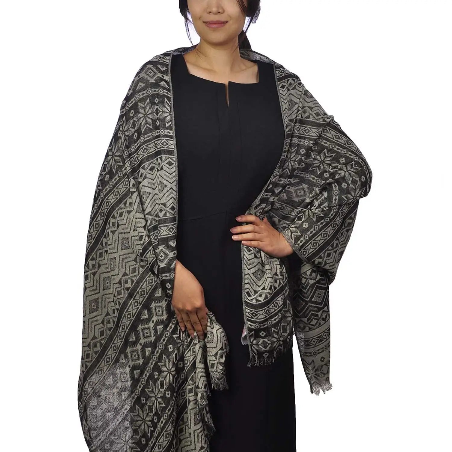 Oversized Aztec patterned shawl scarf worn by woman