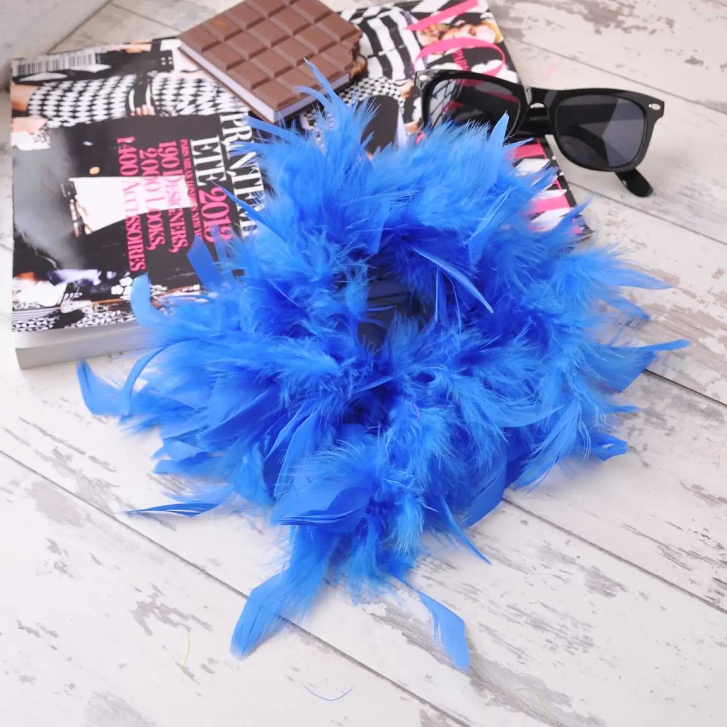 Blue feather hair scrunchie with book and sunglasses, Bright, Colourful, Unique.