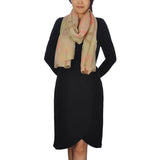 Woman in black dress & beige scarf modeling Oversized Lightweight Scarf with Heart Print & Neon Colours