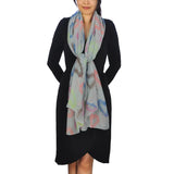 Woman wearing grey scarf with multi floral print from Oversized Lightweight Scarf with Heart Print & Neon Colours.