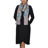 Oversized Lightweight Scarf with Heart Print & Neon Colours worn by woman