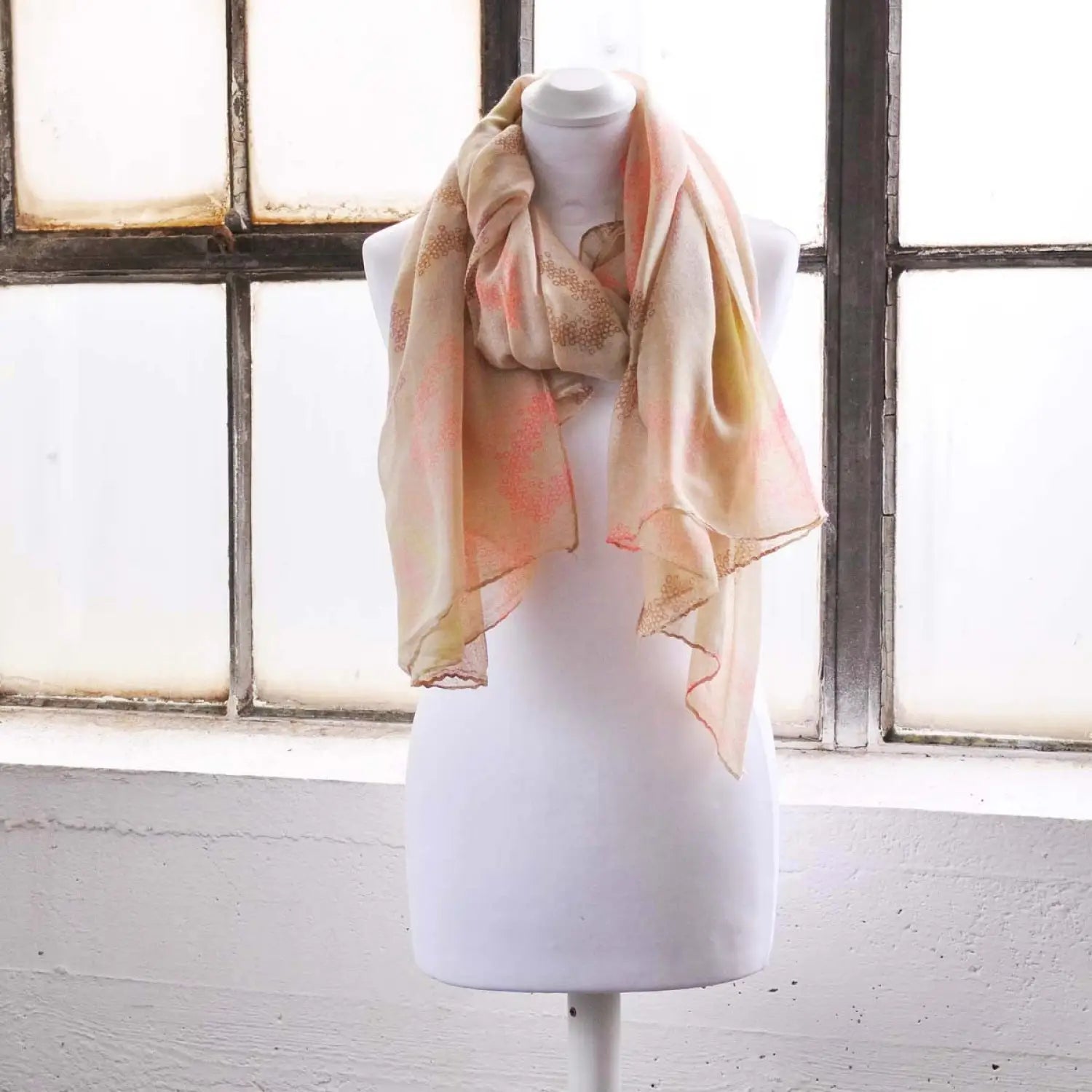 Oversized Lightweight Scarf with Heart Print & Neon Colours on mannequin by window