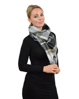 Oversized Tartan Check Winter Blanket Poncho featuring a woman in black dress and plaid scarf