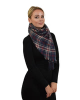 Oversized Tartan Check Winter Blanket Poncho featuring a woman in a black dress and plaid scarf