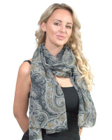 Woman wearing grey and yellow paisley floral maxi oversized Korean scarf.